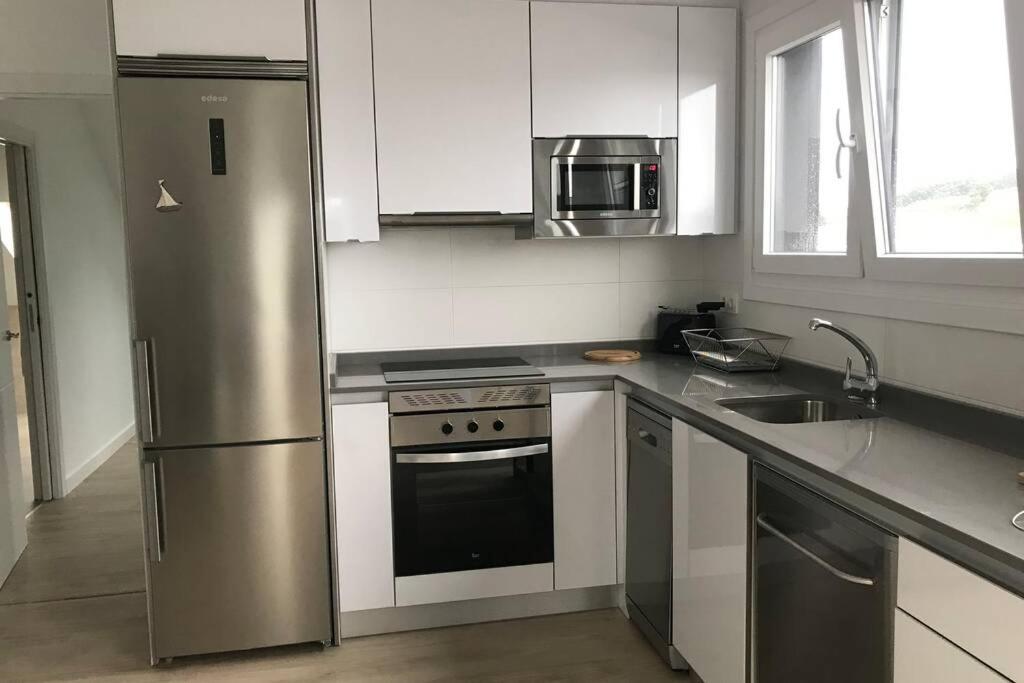 Apartamento Atico Miramar, ลูอันโก ภายนอก รูปภาพ